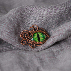 Брошь-кулон Глаз дракона зеленый